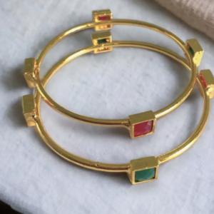 Crimson Gold Bangles – Bold and classic.